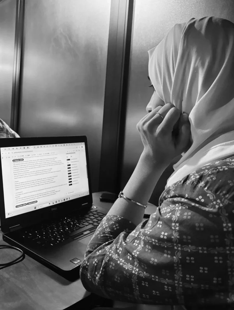 Freelance digital marketer working on laptop